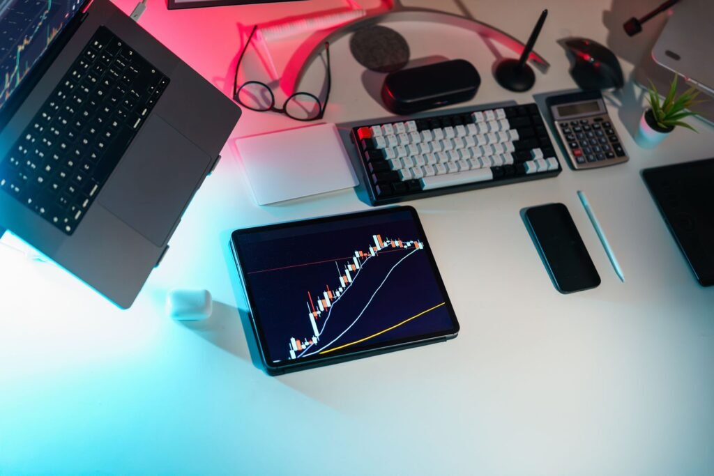 A person looking at multiple screens with cryptocurrency charts, symbolizing productive digital asset management.
