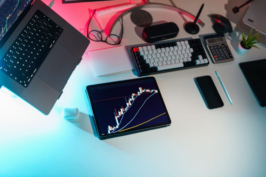 A person looking at multiple screens with cryptocurrency charts, symbolizing productive digital asset management.
