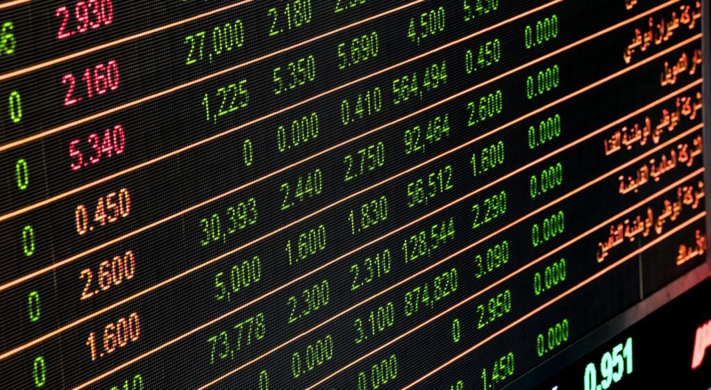 A bustling stock market trading floor with digital tickers and traders.