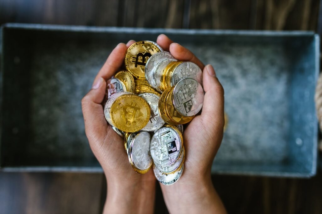 AI robot interacting with digital cryptocurrency coins, symbolizing the convergence of artificial intelligence and digital assets.