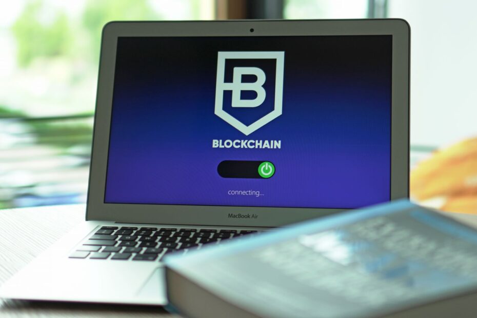 Abstract visualization of AI algorithms connecting to physical assets on a blockchain