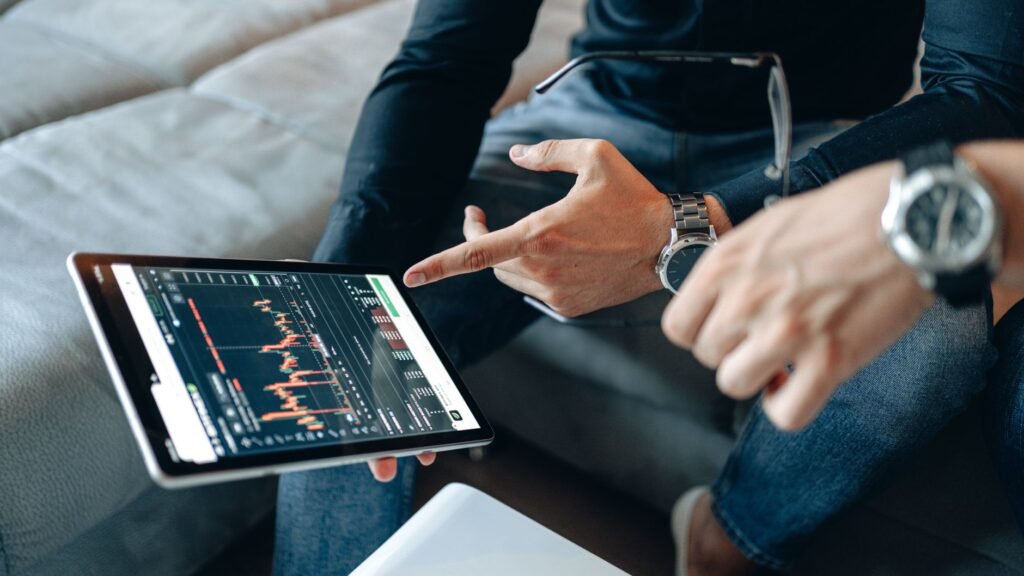 Person looking at multiple screens with crypto charts and news, making a strategic decision.