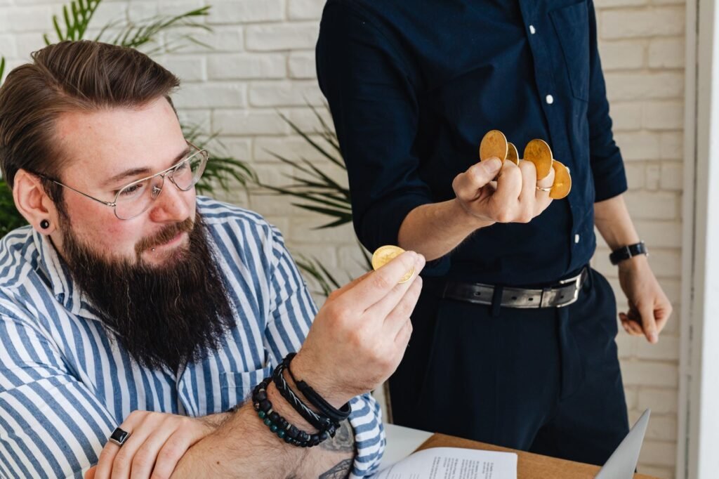 Professional working on a laptop with blockchain elements in the background, symbolizing productivity in the tokenized economy.