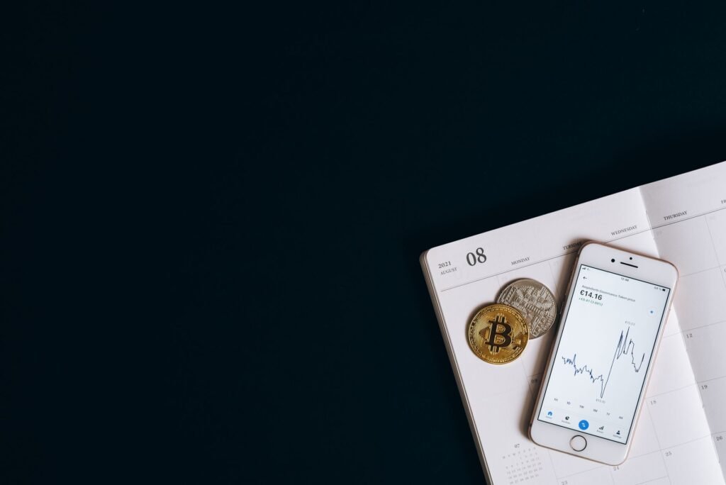 Illustration of various crypto wallets (hardware, software icons) and a lock icon, representing secure digital asset management.